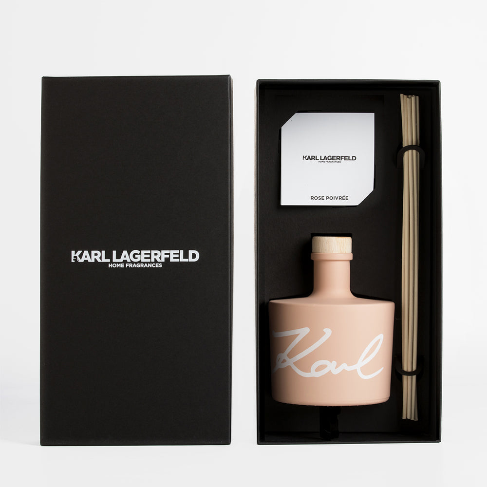 Rose Poivrée diffuser by Karl Lagerfeld in a sleek black box with fragrance sticks and a card.