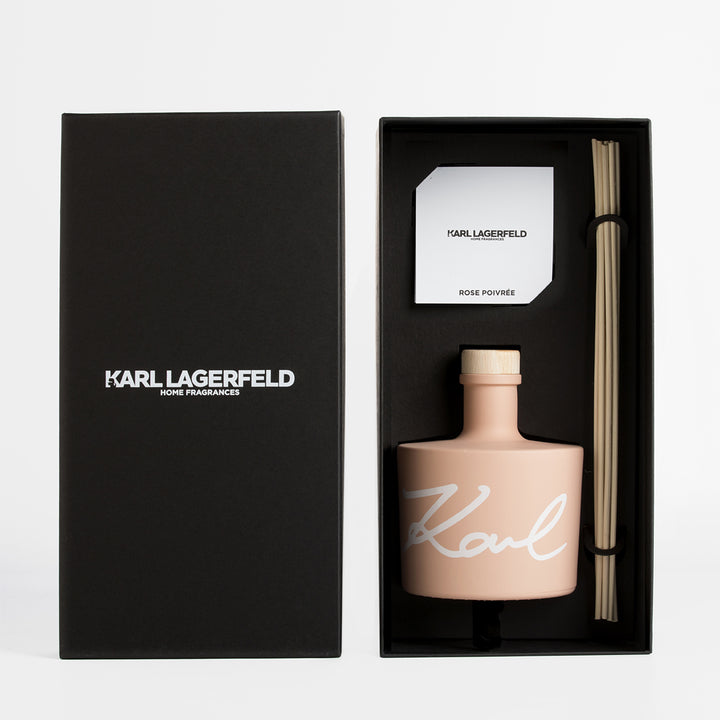 Rose Poivrée diffuser by Karl Lagerfeld in a sleek black box with fragrance sticks and a card.
